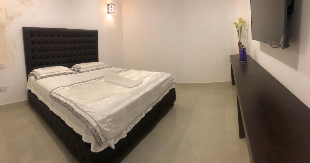 Postel nebo postele na pokoji v ubytování Tiverton Homestay