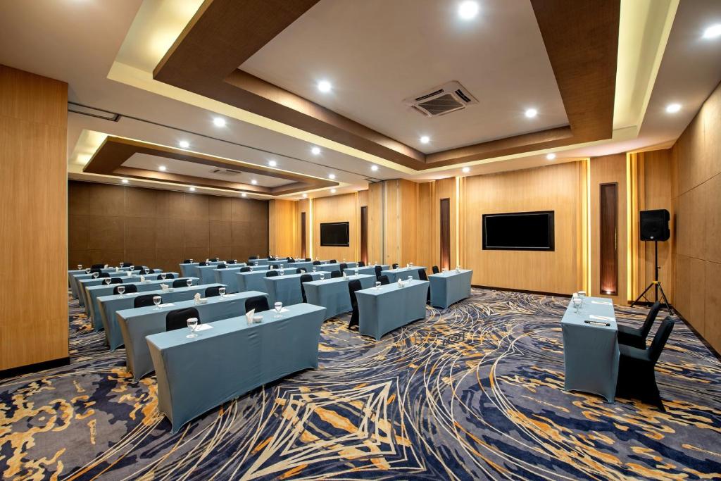 a conference room with a bunch of chairs in it at Oakwood Hotel & Apartments Taman Mini Jakarta in Jakarta