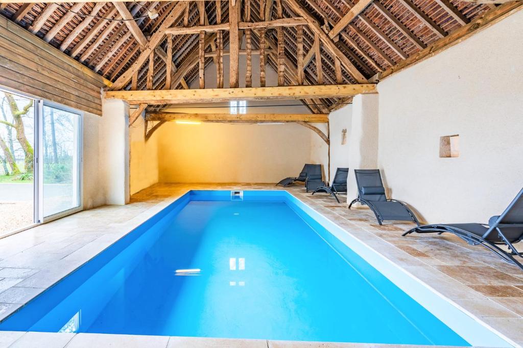 The swimming pool at or close to Crazy Villa Champs Corons 61 - Interior heated pool - 2h from Paris - 30p