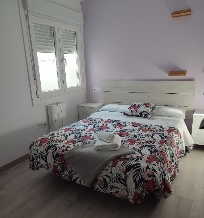 Posteľ alebo postele v izbe v ubytovaní ApartmentoTerra de Augas 1