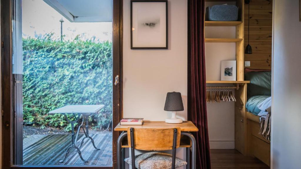 Posteľ alebo postele v izbe v ubytovaní Studio Cosy à la montagne