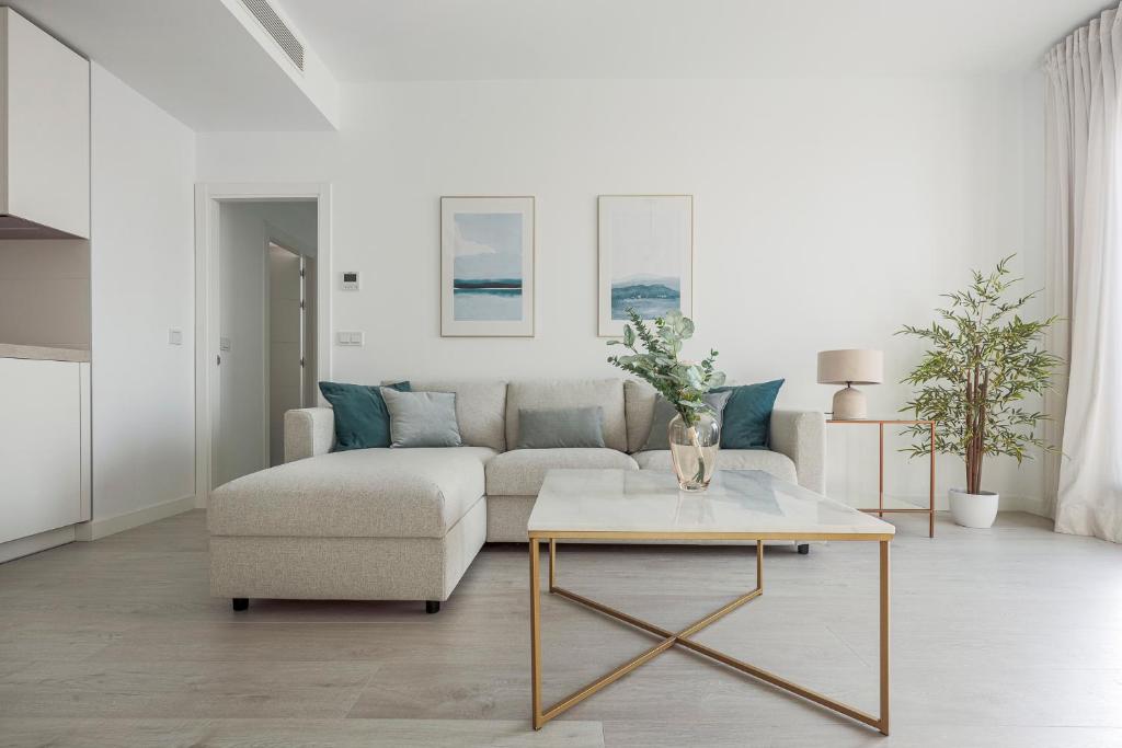 Posezení v ubytování Uxama Sevilla Luxury Penthouse en Triana - Terraza y parking privados - piscina