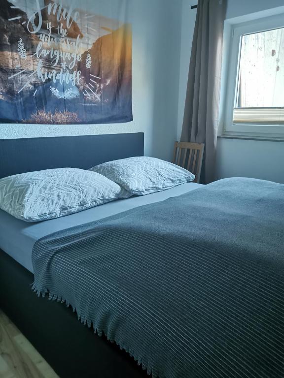 Postel nebo postele na pokoji v ubytování Haus Knoll