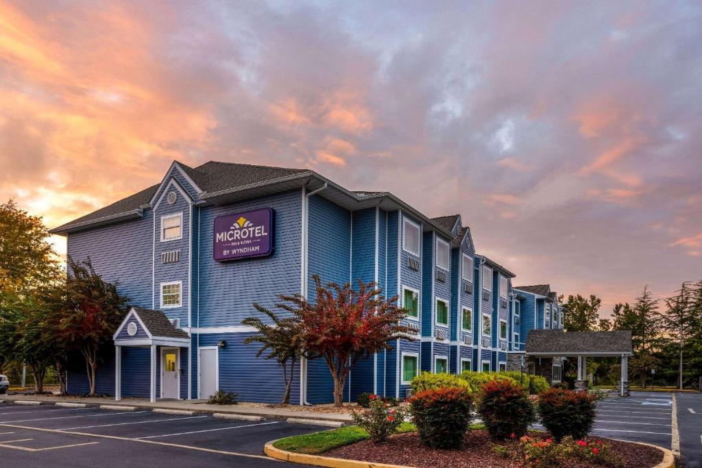 a rendering of a hotel in a parking lot at Microtel Inn and Suites - Salisbury in Salisbury