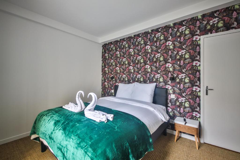 Posteľ alebo postele v izbe v ubytovaní 2.Luxueux Duplex 6/8pers/Full Equipped/République