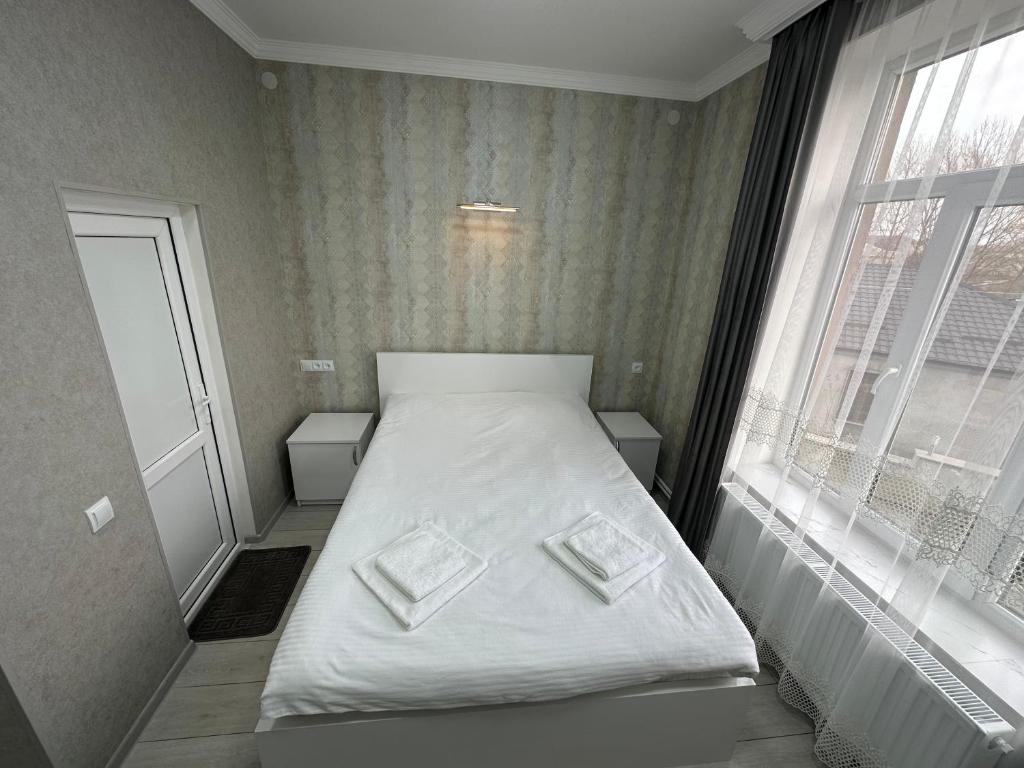 Letto o letti in una camera di Hotel Elit