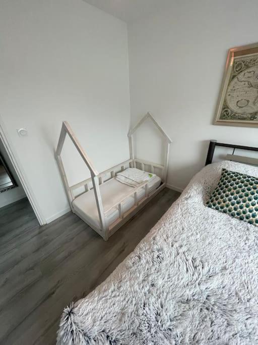 Postel nebo postele na pokoji v ubytování Le Bel Vue