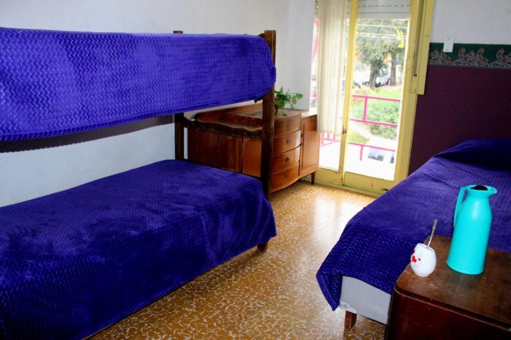Poschodová posteľ alebo postele v izbe v ubytovaní Casa de Fito