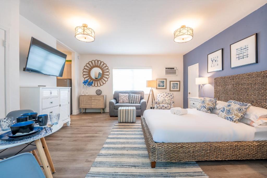 Ein Bett oder Betten in einem Zimmer der Unterkunft PRAIA Hotel Boutique &amp; Apartments Miami Beach