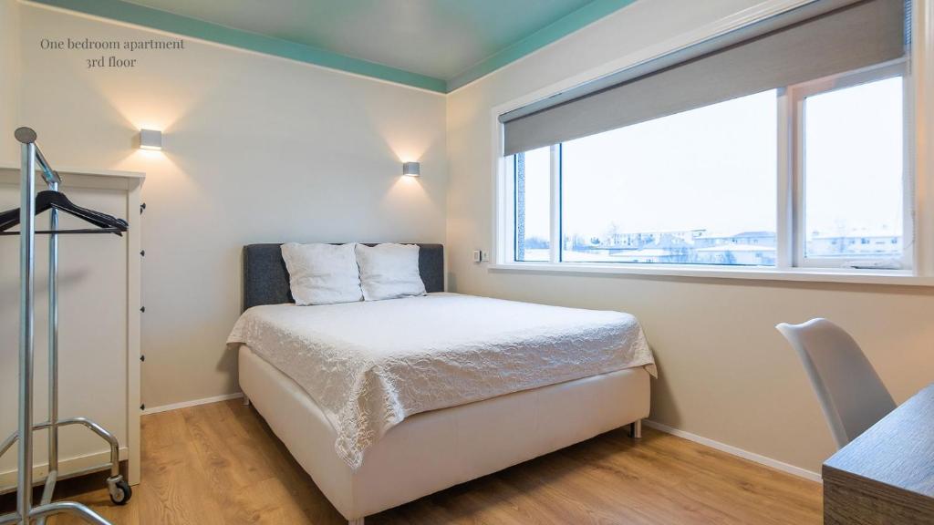 Postel nebo postele na pokoji v ubytování Apartments Reykjavik