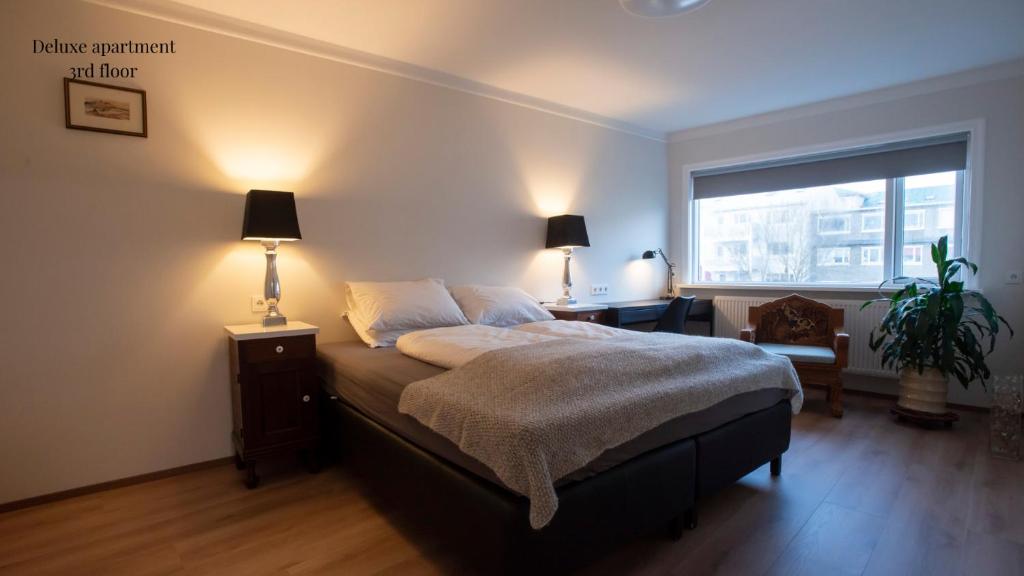 Postel nebo postele na pokoji v ubytování Apartments Reykjavik