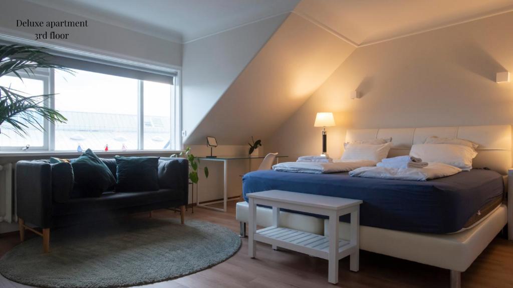 Postel nebo postele na pokoji v ubytování Apartments Reykjavik