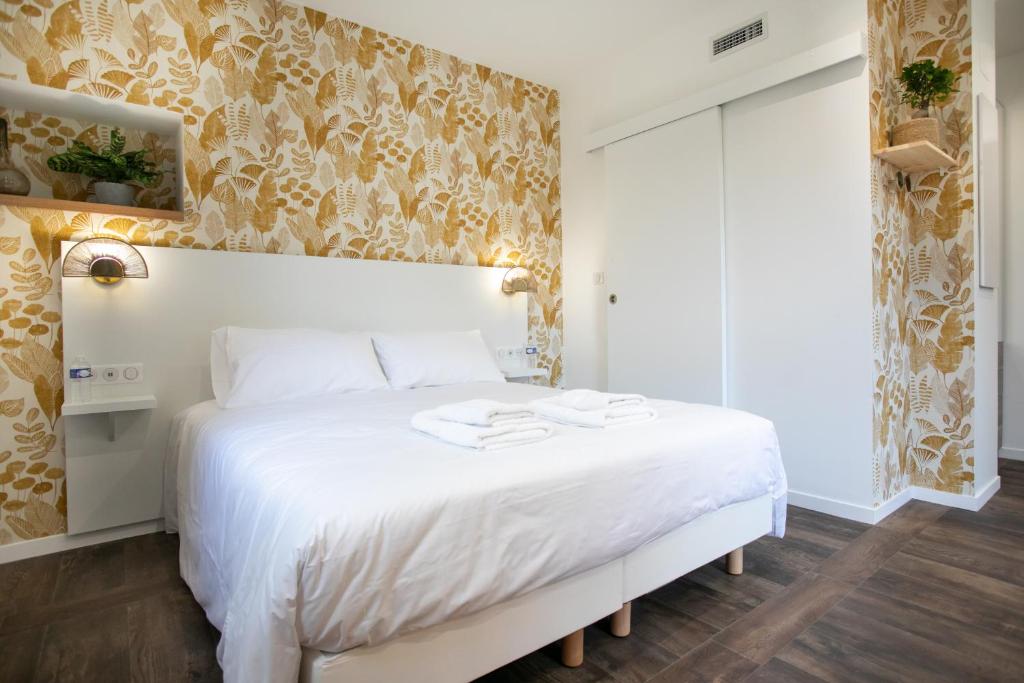 Posteľ alebo postele v izbe v ubytovaní Le Maleville - Appartements de Standing