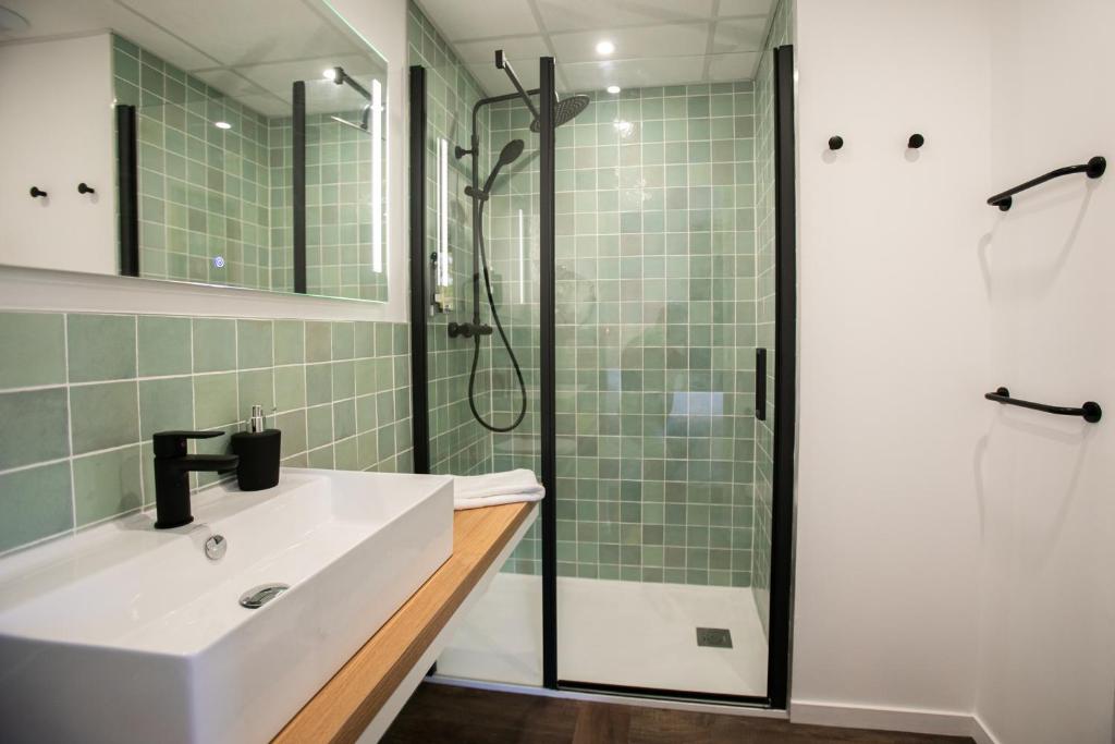 Kúpeľňa v ubytovaní Le Maleville - Appartements de Standing