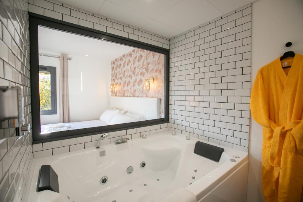 Kúpeľňa v ubytovaní Le Maleville - Appartements de Standing