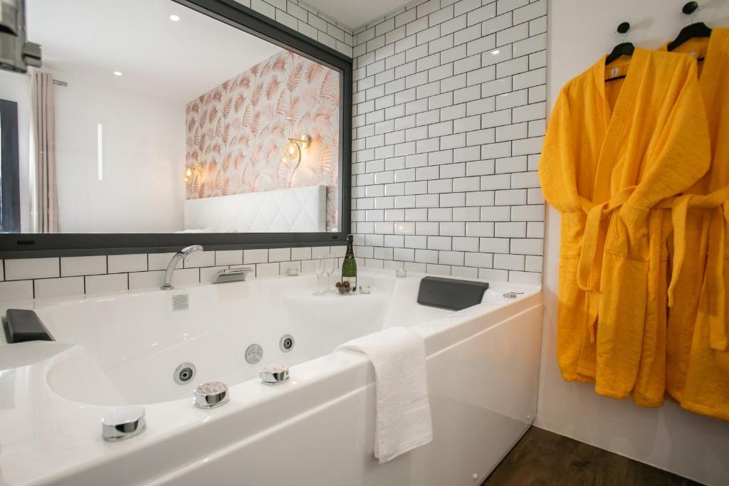 Kúpeľňa v ubytovaní Le Maleville - Appartements de Standing