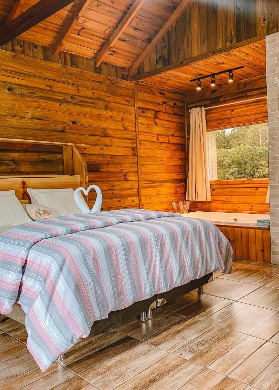 Postel nebo postele na pokoji v ubytování Cabana Furna dos Pôneis