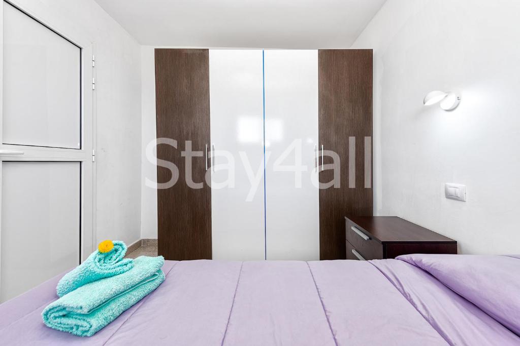 Posteľ alebo postele v izbe v ubytovaní Apartamento Los Molinos