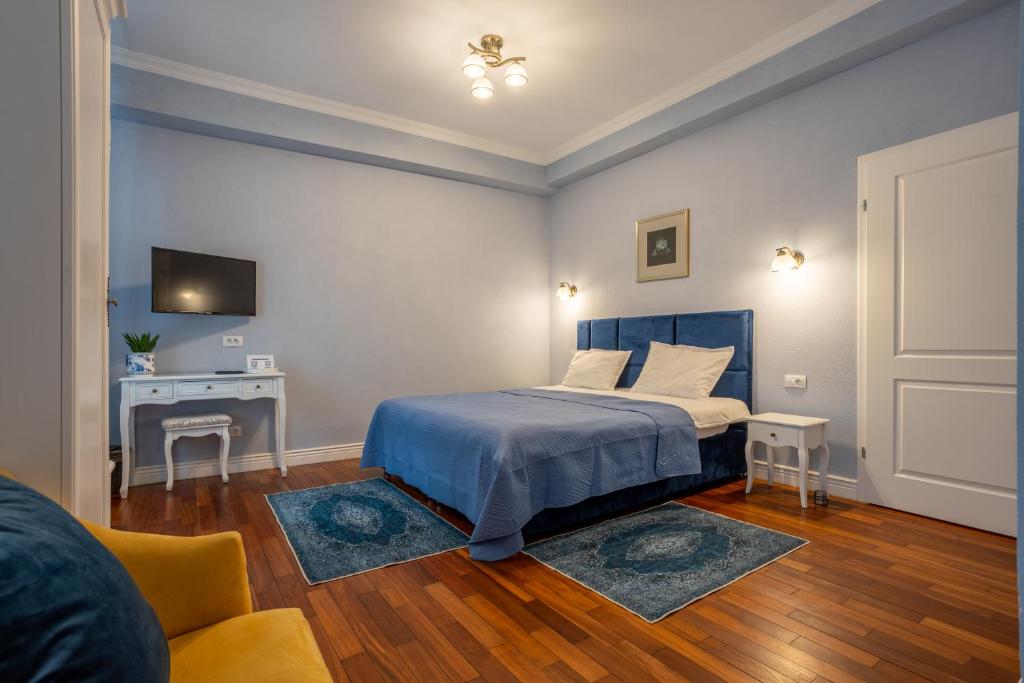 Postel nebo postele na pokoji v ubytování Vila Missy
