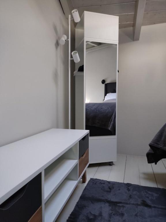 A bed or beds in a room at Vrachos Suites