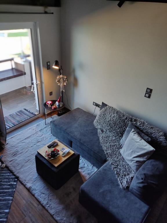 A seating area at Vrachos Suites