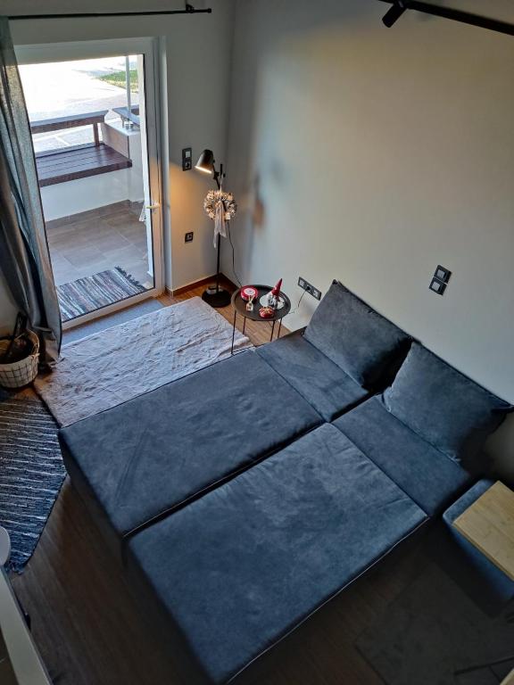 A bed or beds in a room at Vrachos Suites