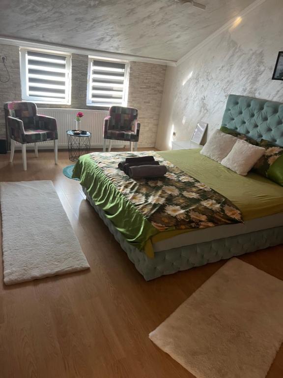 Krevet ili kreveti u jedinici u objektu President spa apartman Arandjelovac
