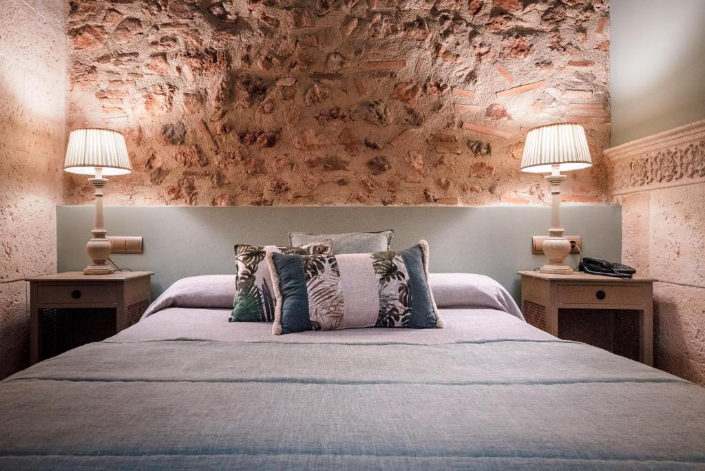 Postel nebo postele na pokoji v ubytování Hotel Casa Babel