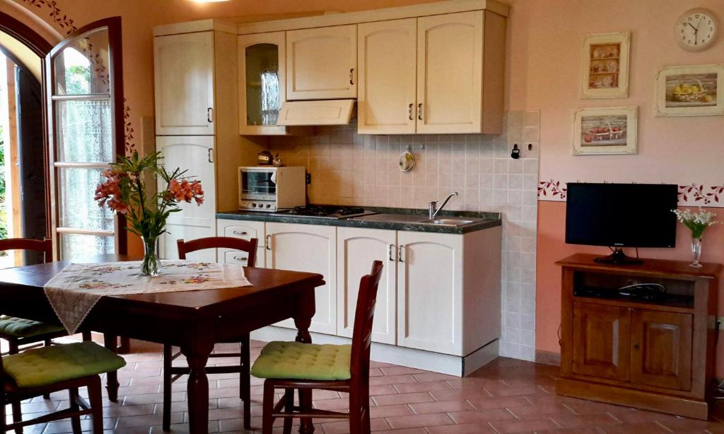 Kuchyň nebo kuchyňský kout v ubytování agriturismo macchia al pino