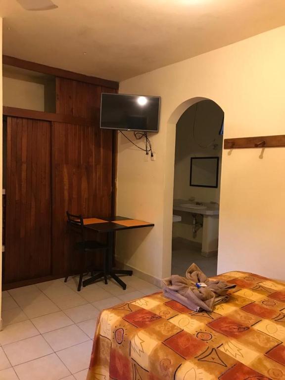 Postel nebo postele na pokoji v ubytování Hotel Sociedad y Maristas
