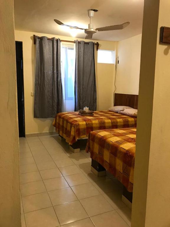 Postel nebo postele na pokoji v ubytování Hotel Sociedad y Maristas
