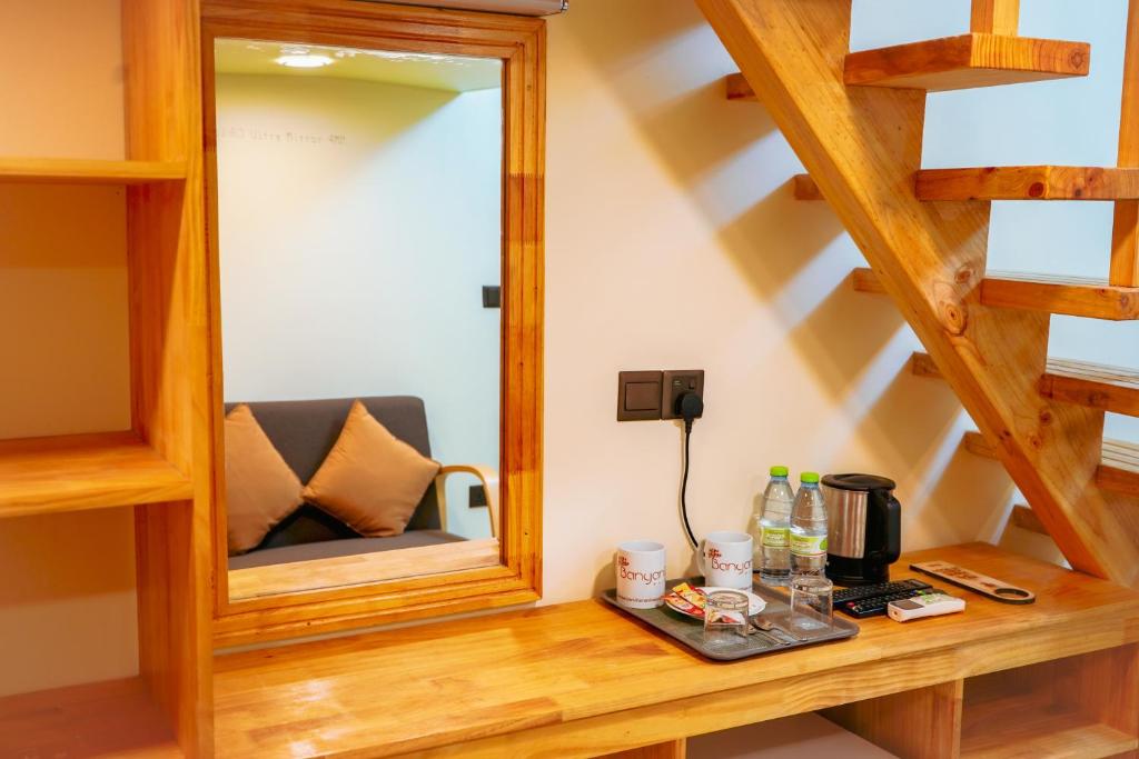 Příslušenství pro přípravu čaje a kávy v ubytování Banyan Villa Maldives Dhangethi