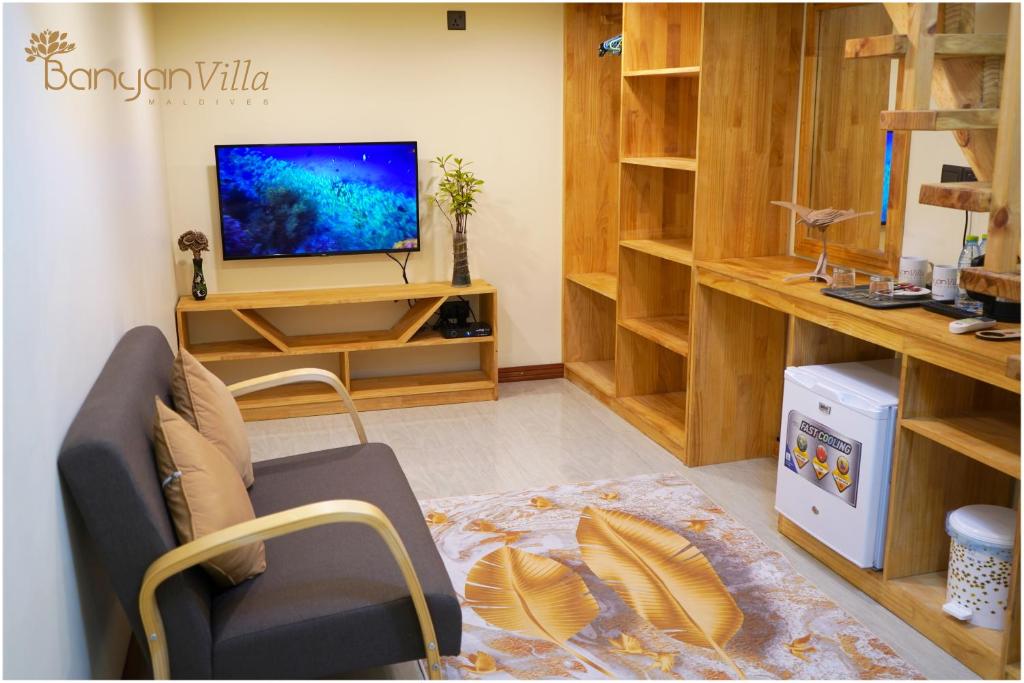 TV a/nebo společenská místnost v ubytování Banyan Villa Maldives Dhangethi
