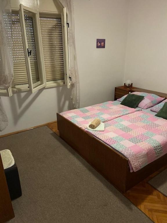 Posteľ alebo postele v izbe v ubytovaní Rooms Juran