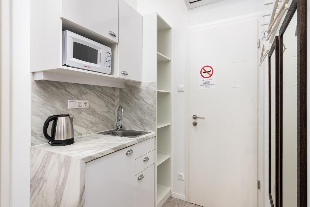 Kuchyňa alebo kuchynka v ubytovaní Delta Apartments Budapest