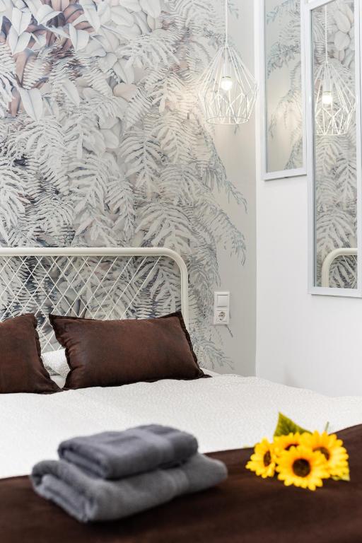 Posteľ alebo postele v izbe v ubytovaní Delta Apartments Budapest