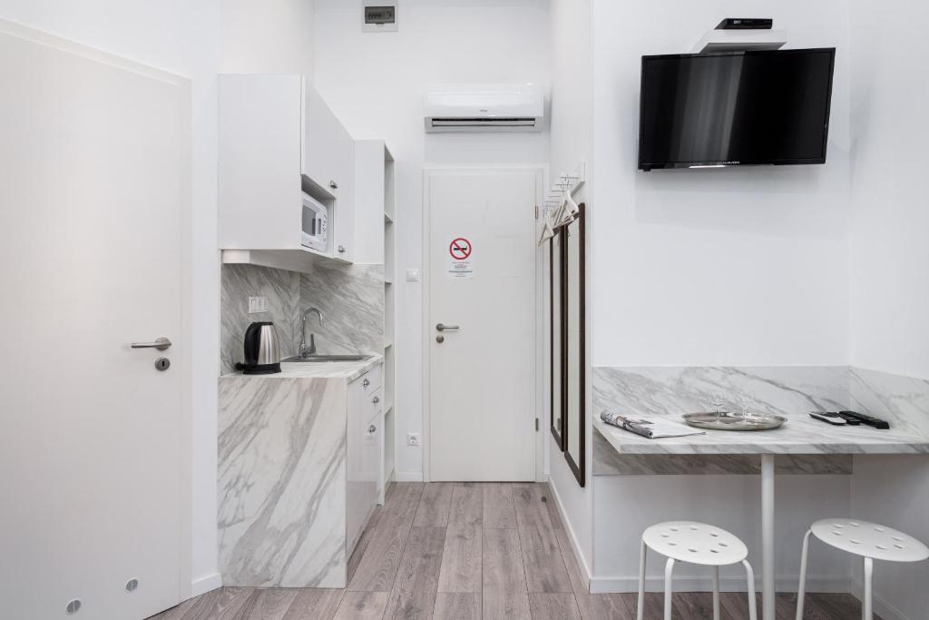 Kuchyňa alebo kuchynka v ubytovaní Delta Apartments Budapest
