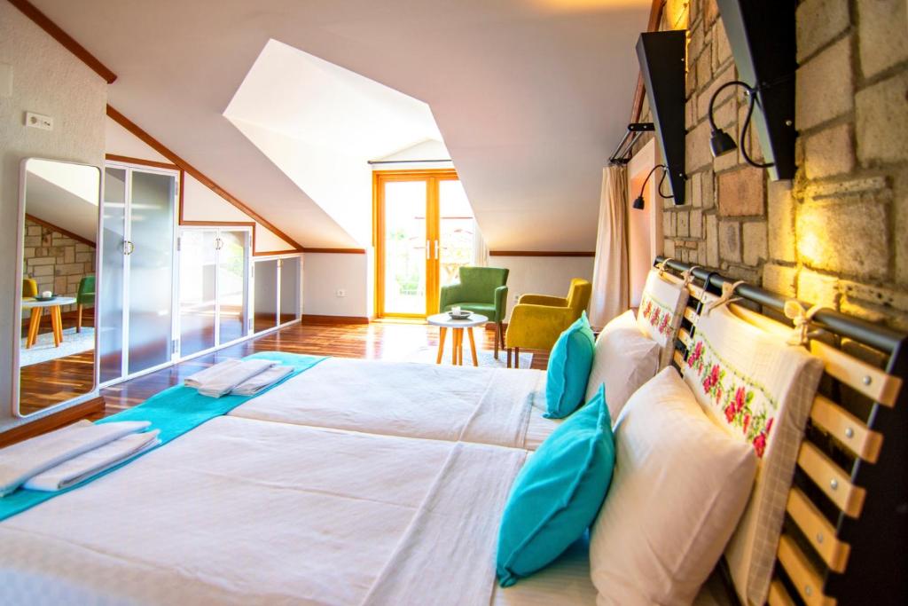 A bed or beds in a room at Dalyan Villa StoneHouse-1