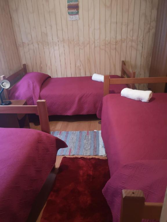 Letto o letti in una camera di Cabañas Kela