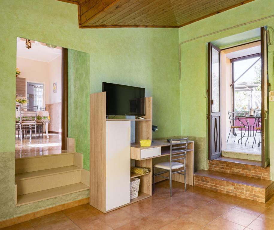 Telewizja i/lub zestaw kina domowego w obiekcie Villa Laura