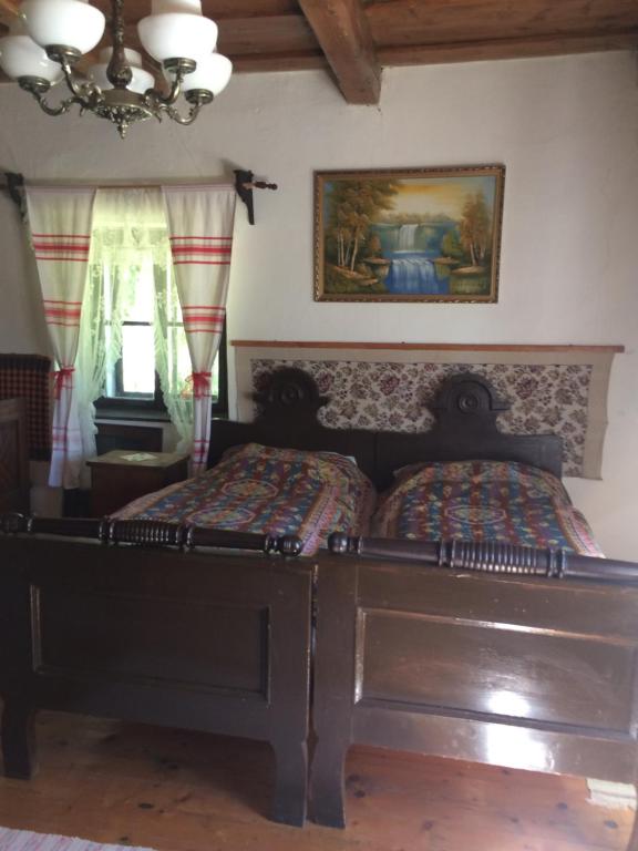 Postel nebo postele na pokoji v ubytování Vén Diófa Kúria