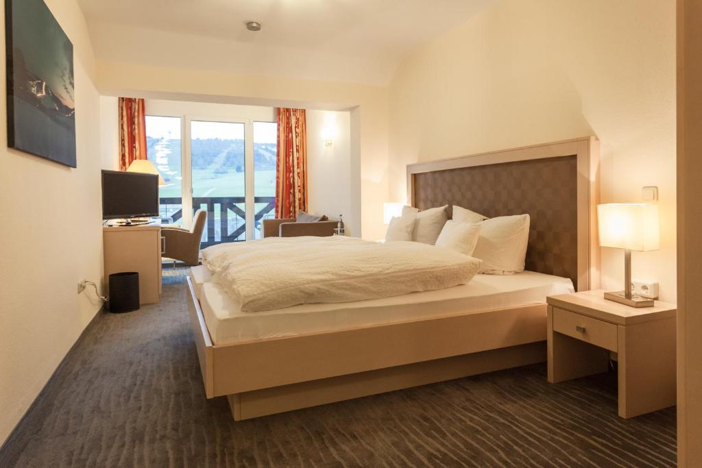 Postel nebo postele na pokoji v ubytování Hotel Magdalenenhof inklusive MeineCardPlus