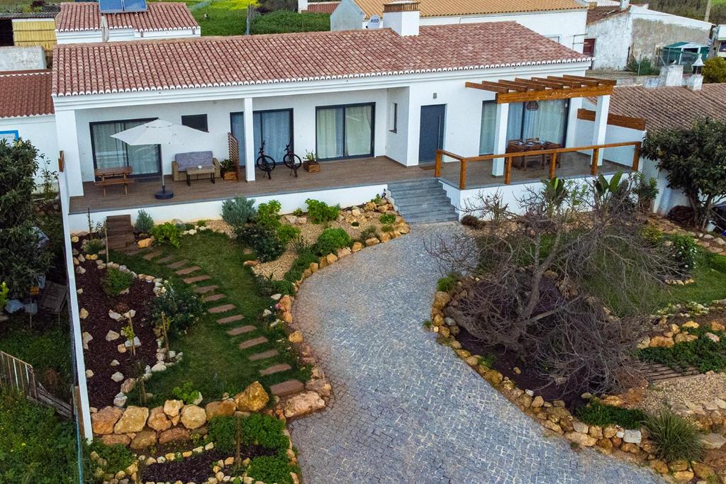 an aerial view of a house with a garden at Casa Monte Salema in Vila do Bispo