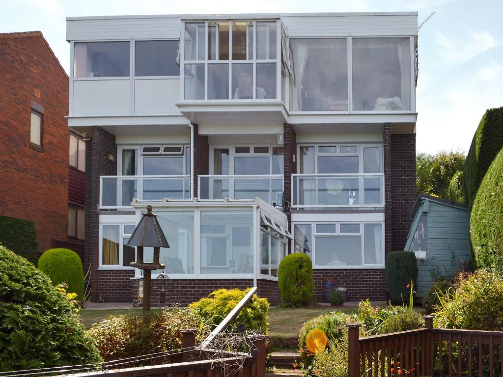 a large house with a lot of windows at The Lookout in Torquay