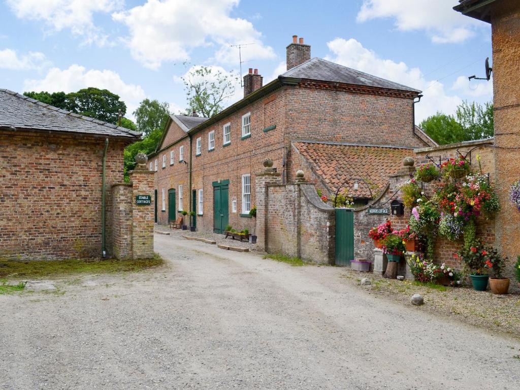 an empty street in an old brick building at Stable Cottage 1 in Rudston