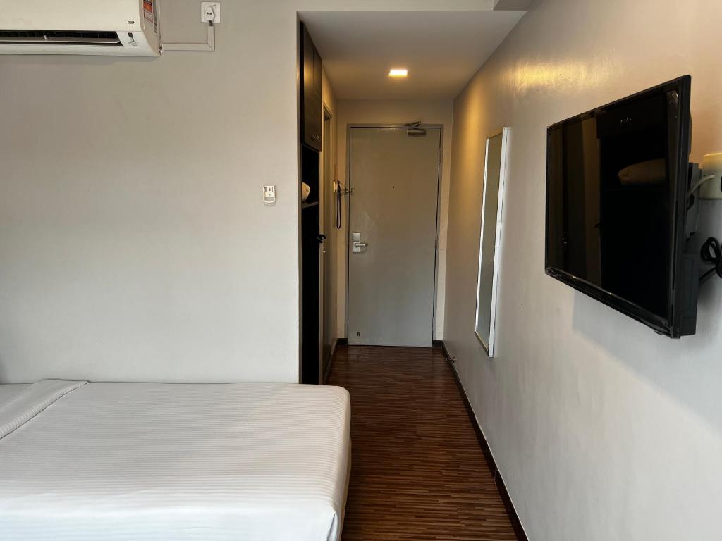 TV a/nebo společenská místnost v ubytování Signature Hotel