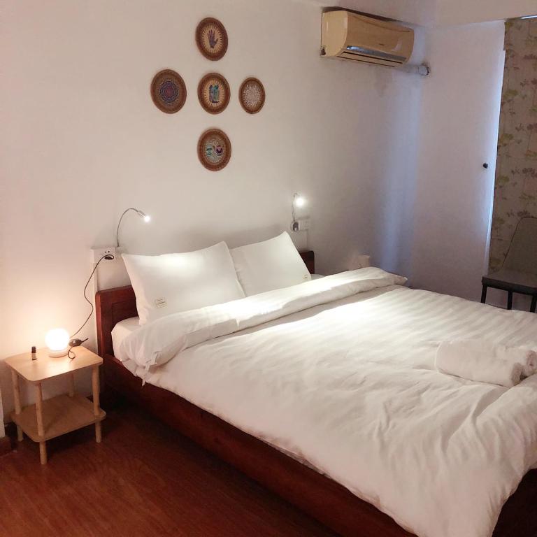 Postel nebo postele na pokoji v ubytování Hanowood Homestay