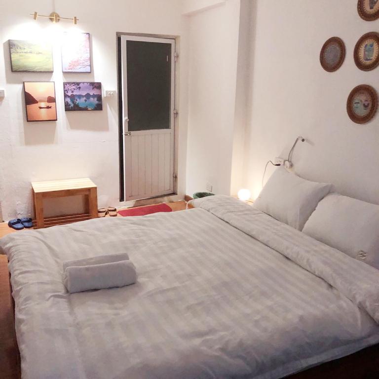 Postel nebo postele na pokoji v ubytování Hanowood Homestay