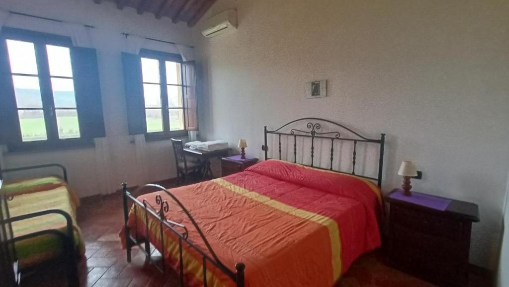 Postel nebo postele na pokoji v ubytování il Chiassetto Agriturismo No Kids