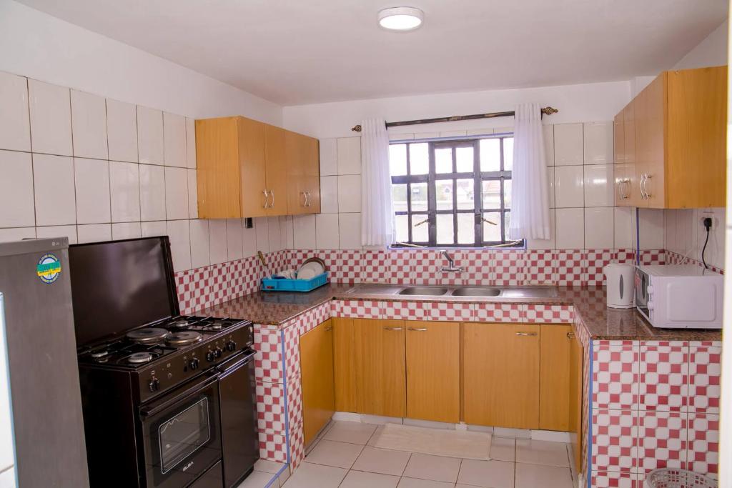 Kuchyň nebo kuchyňský kout v ubytování Hope Homestay